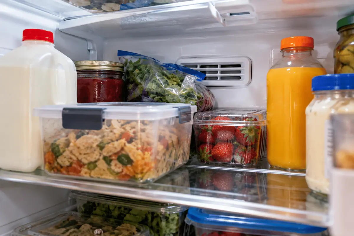 Food containers positioned too close to a refrigerator air vent
